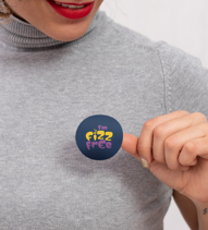 Lady with badge stating i'm fizz free